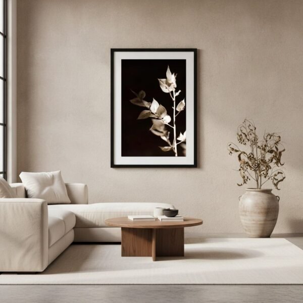 ButhersBroom_FineArt_Mockup_minimalisticLivingroom Butcher’s Broom fine art print in a black frame with white mount, hanging above a light oak sideboard in a minimalist beige living room