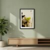 prodigi-GLOBAL-CFPM-20X28-soft_daylight_(natural_light)-framecolour_black-glaze_acrylic _ perspex-frame_classic-papertype_ema-substrateweight_200gsm-mount_2.4mm-mountcolour_snow white Permission to Rest fine art print in a black frame with white mount, hanging above a light oak sideboard in a minimalist beige living room